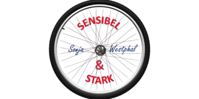 Sensibel & Stark Schrift, im Hintergrund Fahrradspeiche