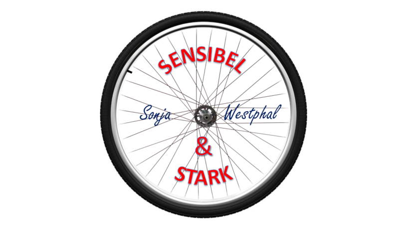 Sensibel & Stark Schrift, im Hintergrund Fahrradspeiche